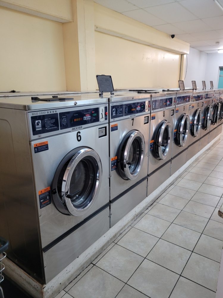 Row of front-load washers and dryers