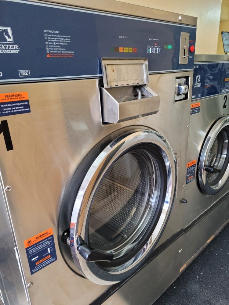 Close-up of a washing machine detergent dispenser